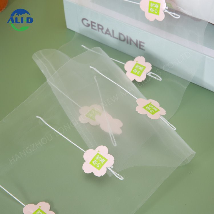 Etiketli ve Dizeli Yenilenebilir Piramit Çay Poşeti Filmi